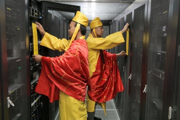 monks blessing the mainframe computers the servers