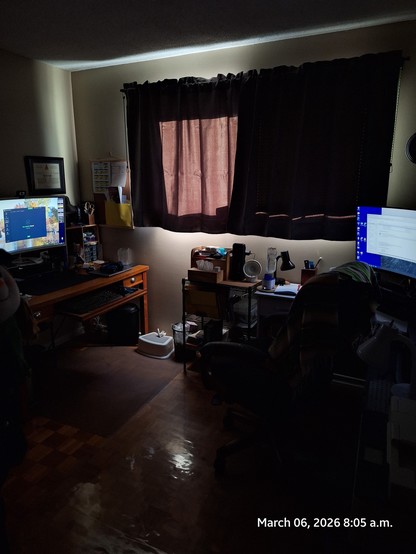 Home office with new blackout curtains.