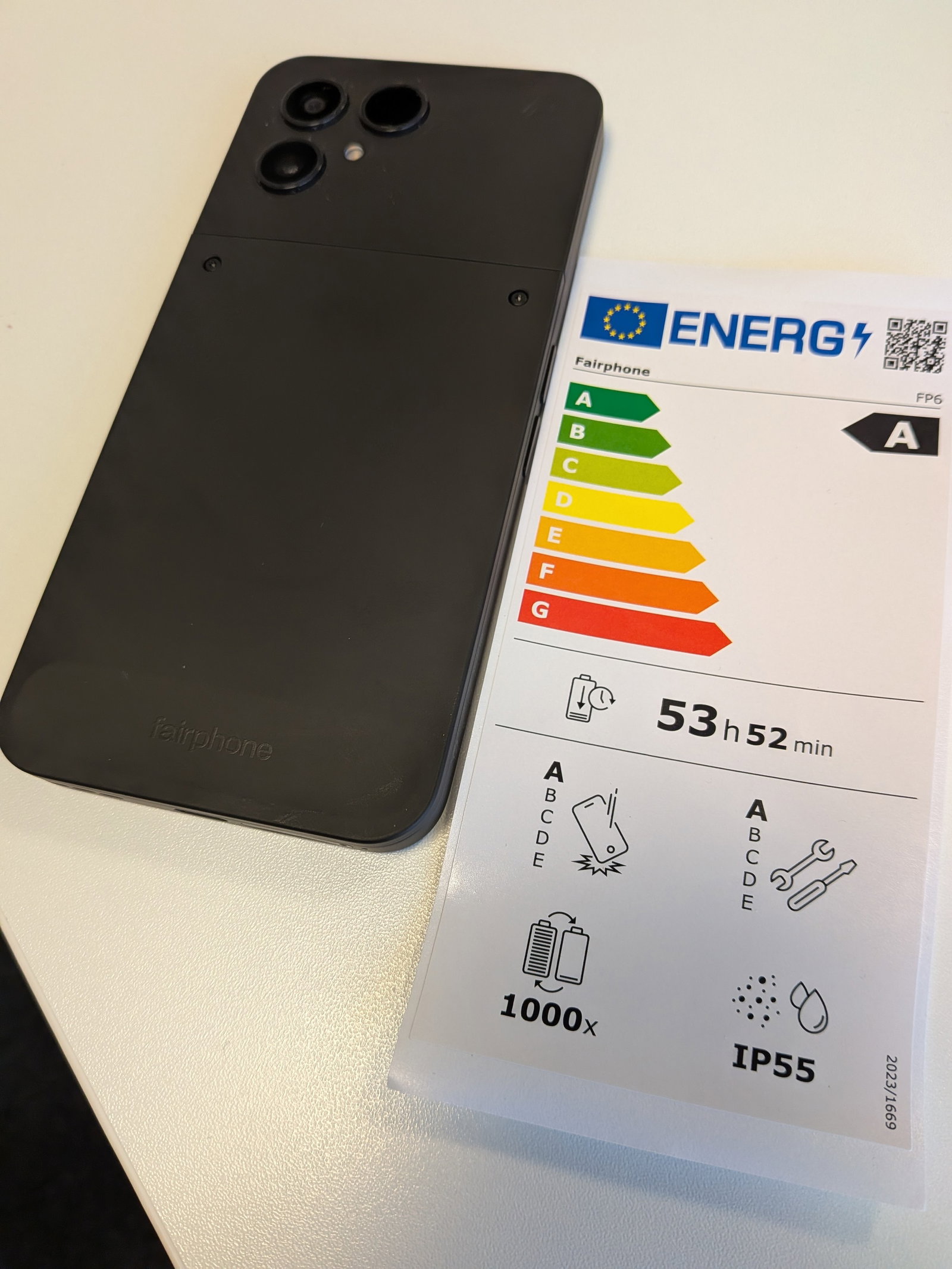 Fairphone with a large energy label sticker