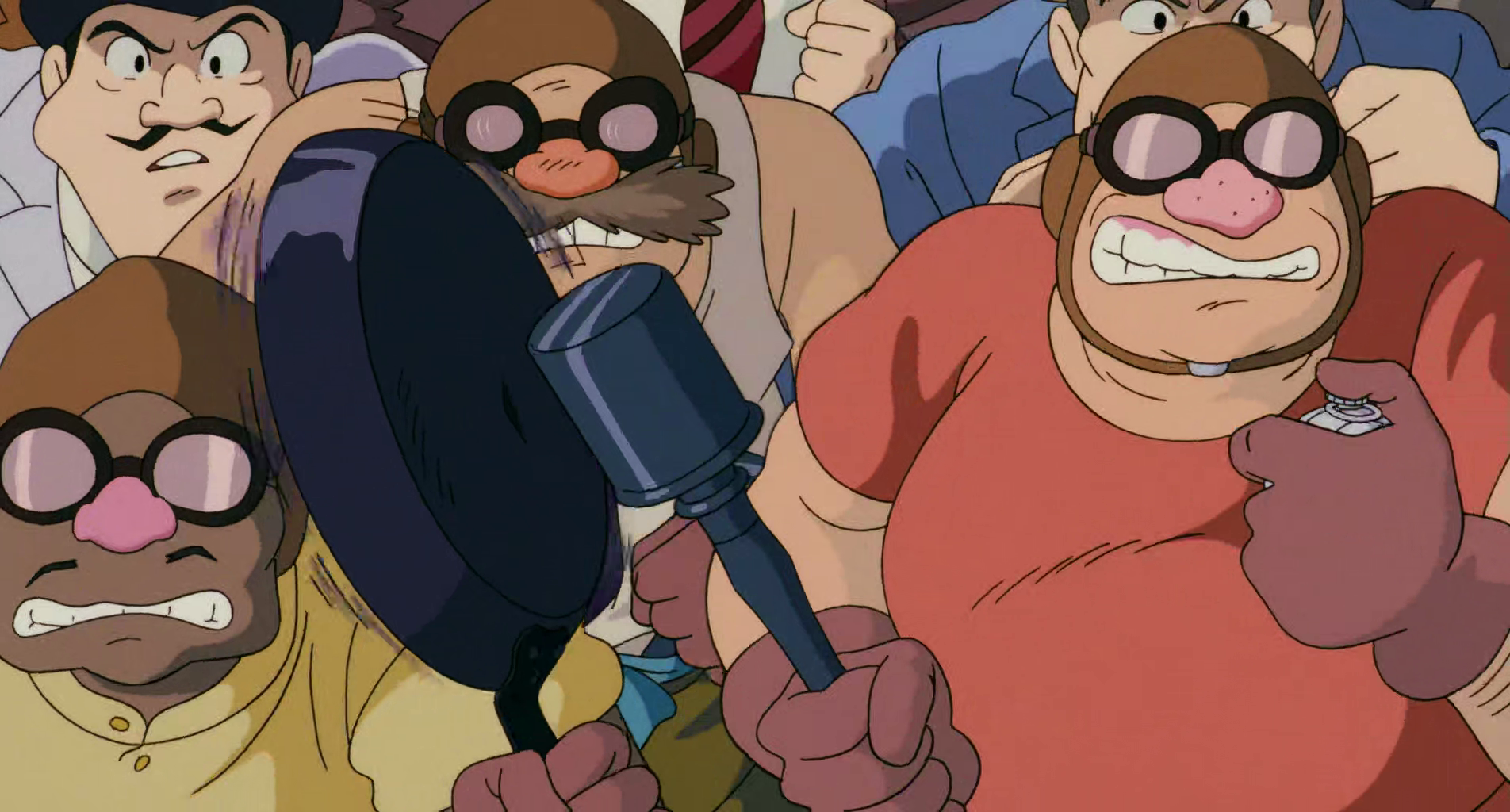 A pirate from Porco Rosso hitting a hand grenade against a pan as a makeshift gong for the ongoing boxing match