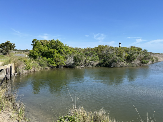 Looking back towards the lighthouse from one of the walking trails alongside a waterway 
