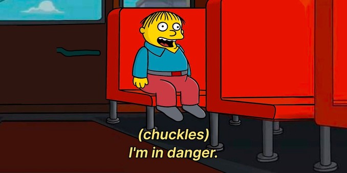 Ralph on a school bus. He chuckles and says "I'm in danger."
