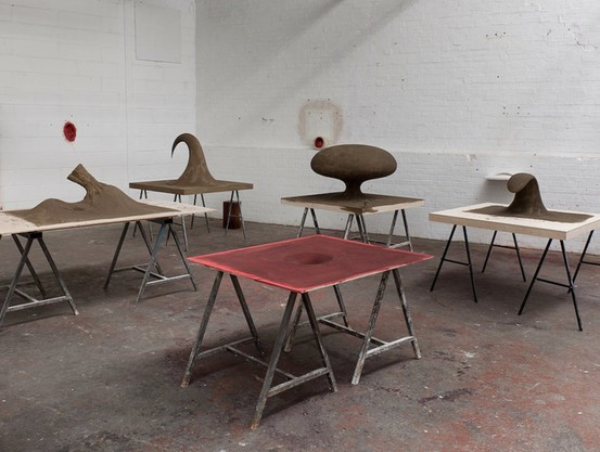 simple abstract sculptures on tables