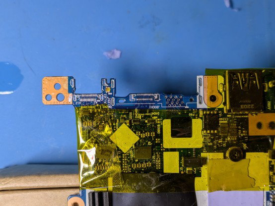 Board with ports removed and new solder applied