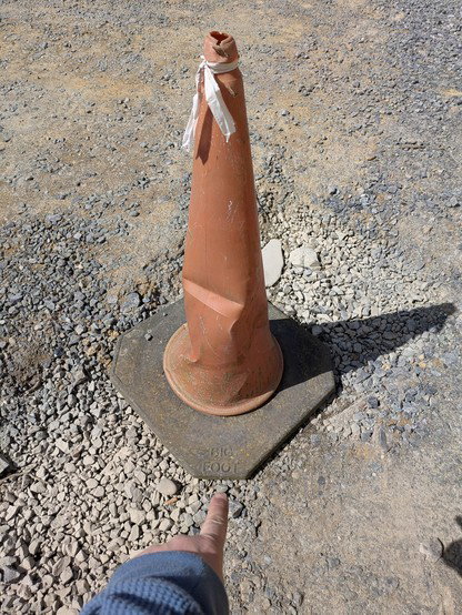 A cone that says BIG FOOT on it