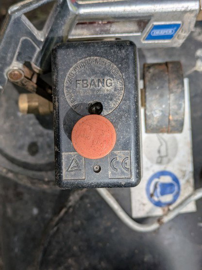A compressor shutoff switch which says FBANG right next to the Big Red Switch