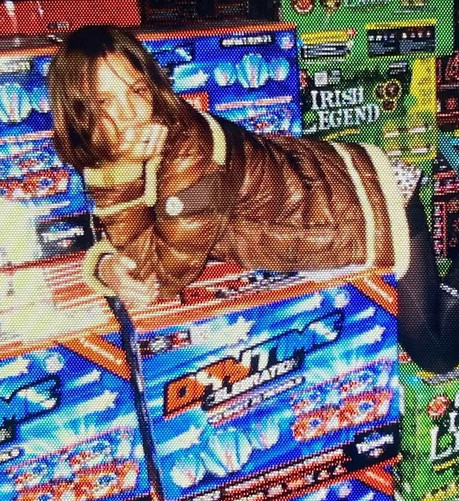 photo of computer screen displaying lady posing on saturated red white blue boxes
