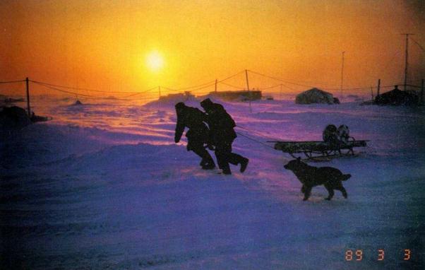 from Sovetskoe Foto magazine. pulling sled thru arctic / Antarctic snow with dog and sunset