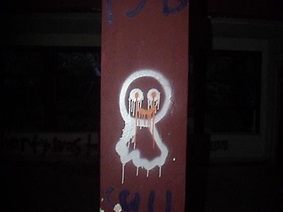 ghost graffiti on pillar