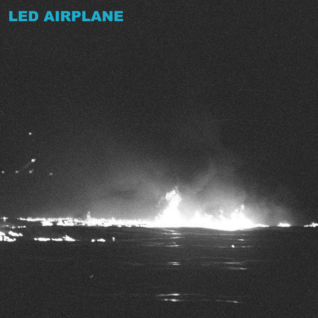 The TWA Flight 800 disaster. Fire on the water. This is black-and-white like the Led Zeppelin cover. The title reads Led Airplane.