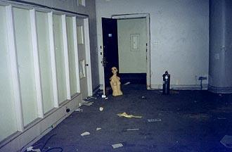 mannequin torso in the doorway