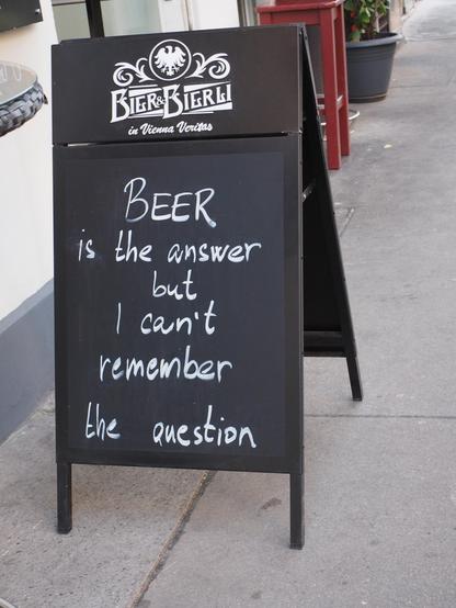 On a blackboard for a restaurant is written: "BEER is the answer but I can't remember the question"