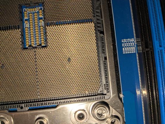 Pic of Altra server cpu socket.. bent pin....   It feels like it's raining and you don't know why.   Something tugs at your heart ... Disappointment