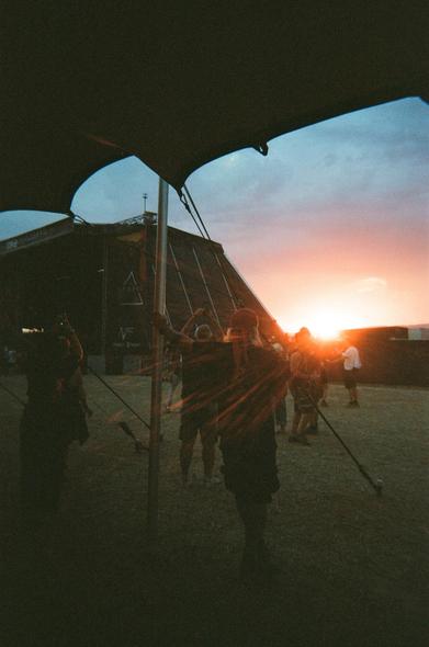analog photo of a sunset at an open air.