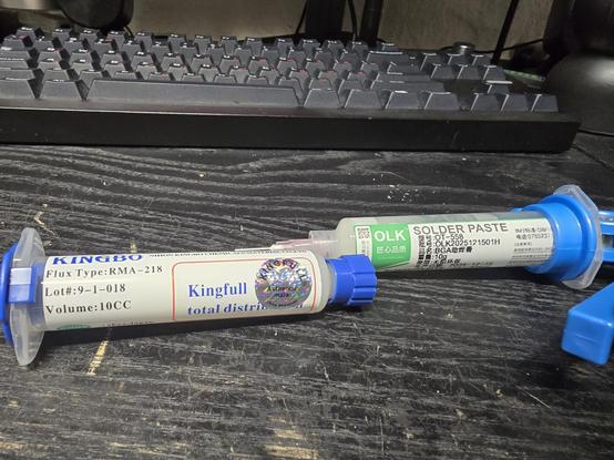 Two bottles of soldering flux, on left unused KingFull RMA-218, on right almost empty OT-558, both from Ali