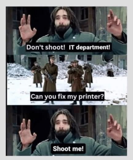 A humorous meme featuring a character with long hair, raising hands in surrender. The top caption reads, "Don't shoot! IT department!" Below, the character asks, "Can you fix my printer?" and finally, the caption changes to "Shoot me
