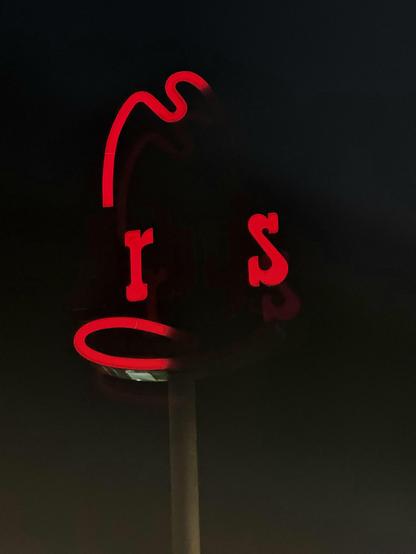 broken Arby's sign at night