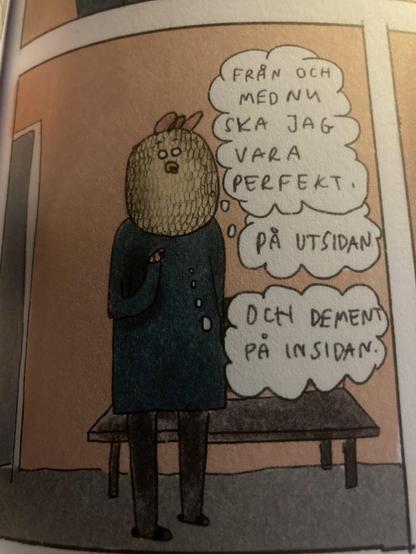 A cartoon character with a textured, bird-like head, wearing a dark coat, stands inside a room. The character expresses a desire to appear perfect on the outside while feeling demented on the inside, indicated by text in speech bubbles.